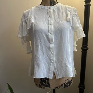 I’m selling this Alexis top, new without tag, size L color cream.